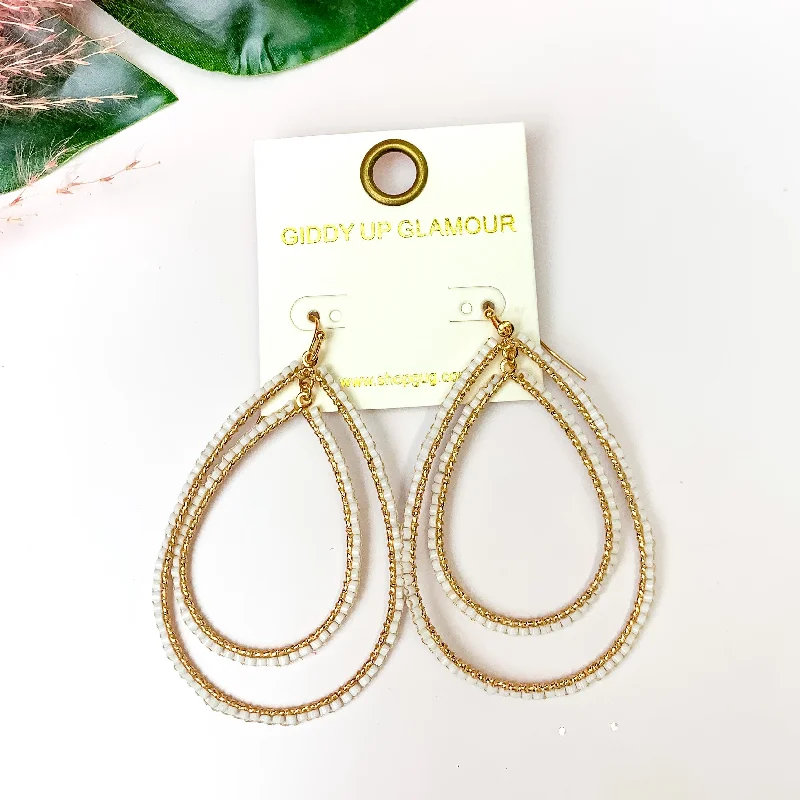 Bead weave earrings-Double Open Teardrop Gold Tone Earrings with Beaded Outline in White