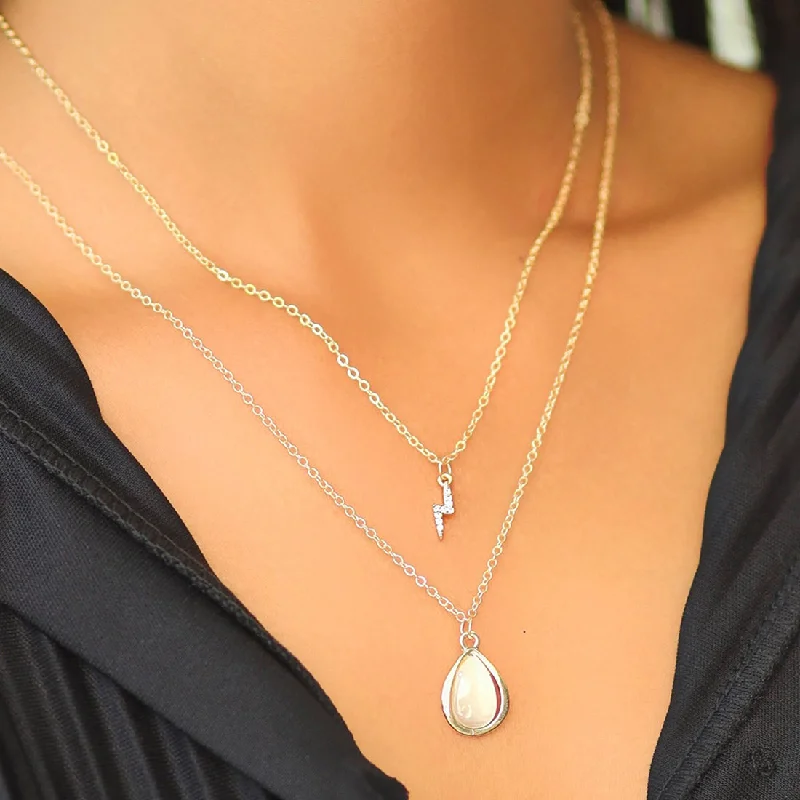 Turquoise gem necklaces-Contemporary Diamante Studded Lightning & Moonstone Teardrop Pendant Gold-Toned Multi-Layered Necklace