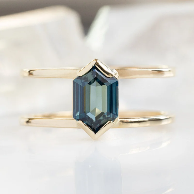 Subtle halo engagement rings-The Poppy Ring | 1.24ct Hexagon Blue Sapphire in 14K Yellow Gold