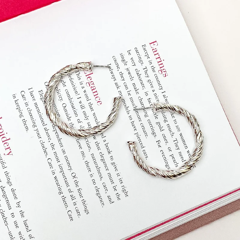 Reef knot earrings-Anything Goes Twisted Medium Hoop Earrings in Silver Tone