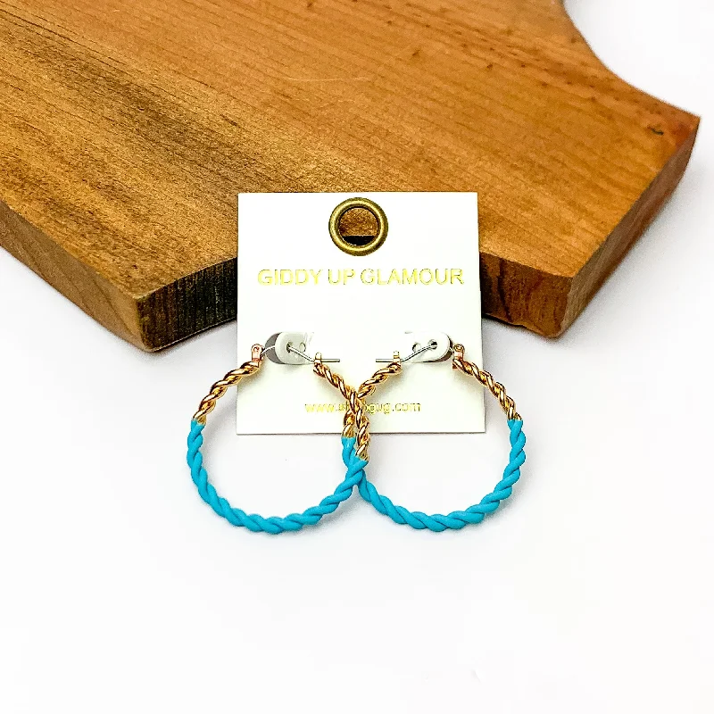 Clear star earrings-Twisted Gold Tone Hoop Earrings in Ocean Blue