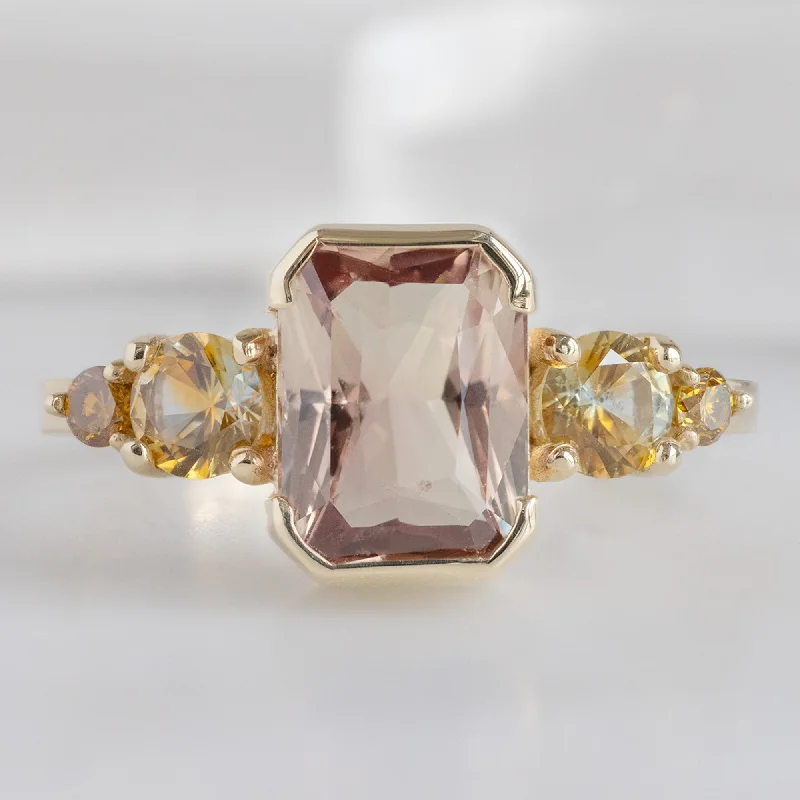 Organic shape engagement rings-The Watercolor Ring | 2.04ct Emerald Cut Peach Sapphire in 14K Yellow Gold