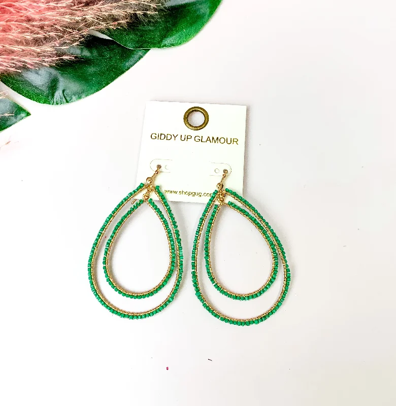 Clear star earrings-Double Open Teardrop Gold Tone Earrings with Beaded Outline in Green