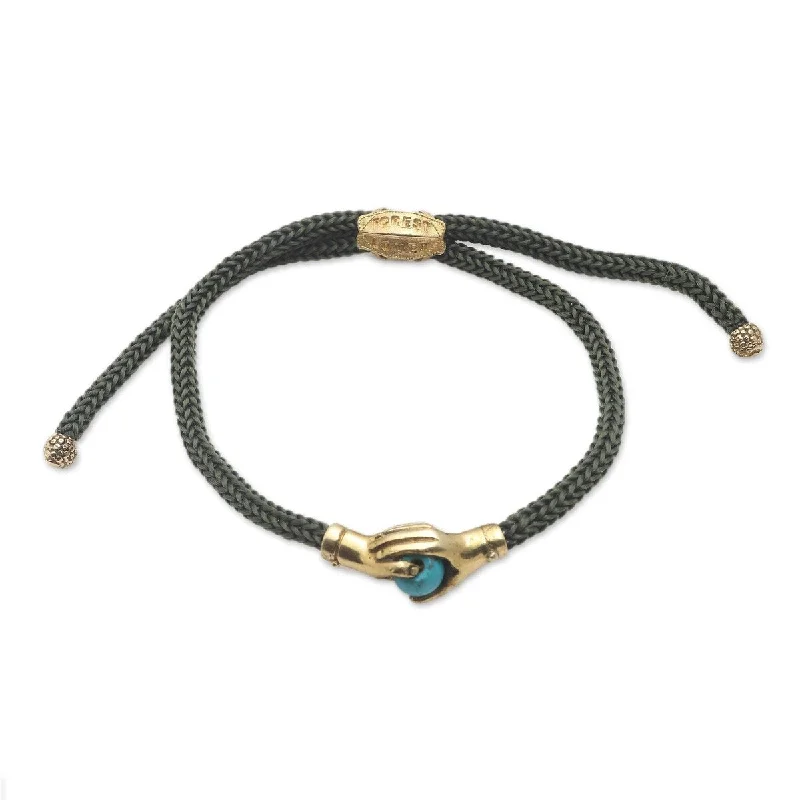 Snap clasp bangles-NOVICA Golden Blue Handshake, Brass and turquoise unity bracelet