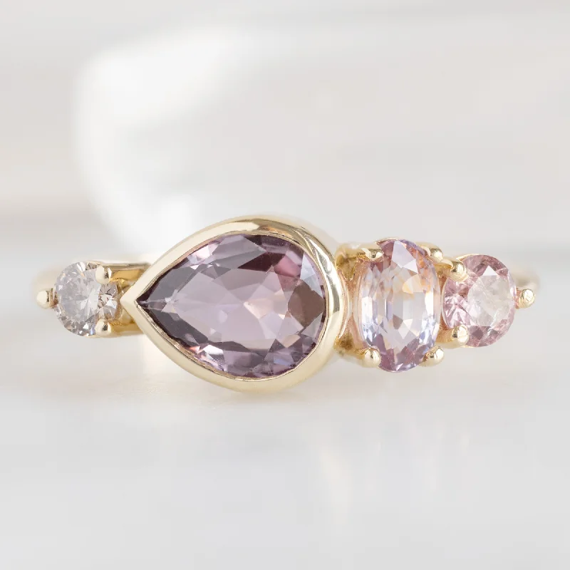 Sculptural engagement rings-The Watercolor Ring | 1.27ct Pear Magenta Sapphire in 14K Yellow Gold