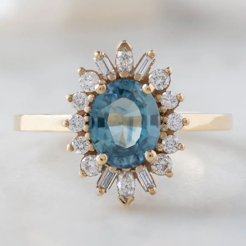 Cushion cut engagement rings-The Camellia Ring | 1.32ct Oval Blue Montana Sapphire in 14K Yellow Gold