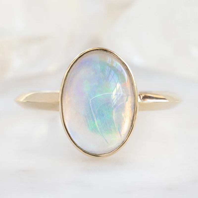 Floral carved engagement rings-The Hazel Ring | 1.97ct Oval Opal in 14K Yellow Gold