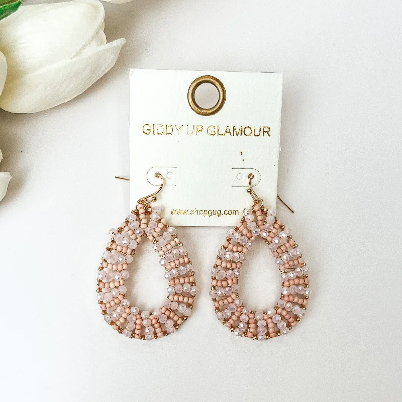 Zodiac charm earrings-Gold Tone Teardrop Earrings with Light Pink Beaded Outline